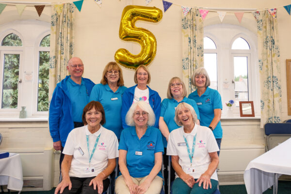 8 Volunteers with no 5 balloon