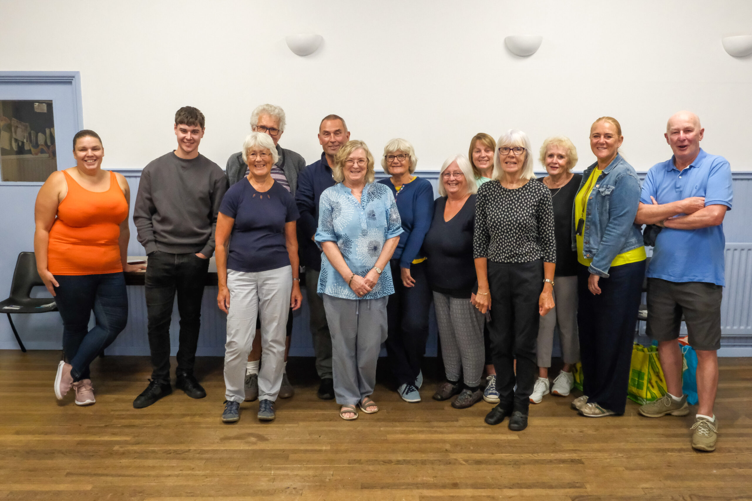 Group photo of Slaithwaite Meals on Wheels volunteers with Kim in centre.